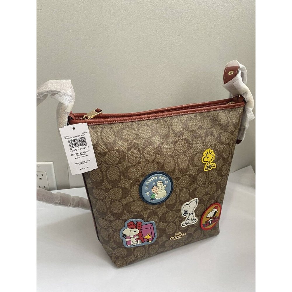 COACH PEANUTS VAL Duffle Signature Canvas Snoopy Winter Patches CF293 NWT